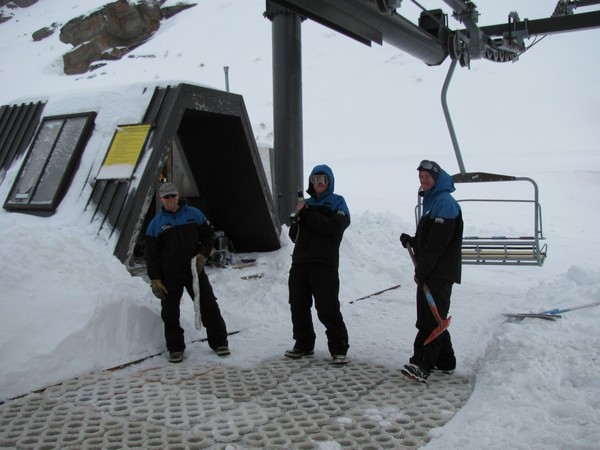 From left, Bruce Cocking, Jarryd Hartshorne and Adam Newman clearing snow at the base of the Shadow Basin Chair